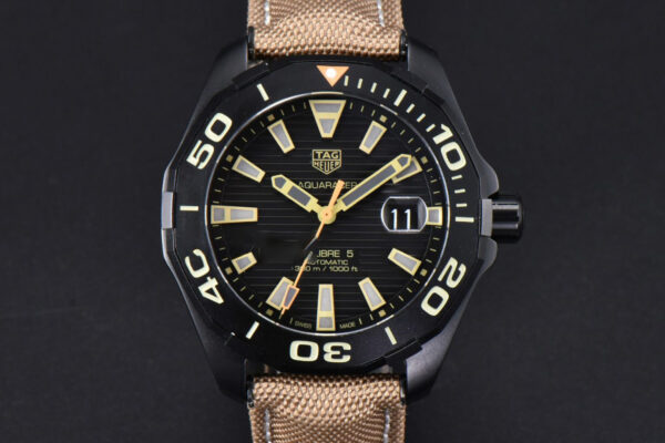Aquaracer Caliber 5 43mm OF Ceramic Black Dial Yellow Hand Brown Nylon Strap SW200